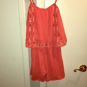 An orange medium romper